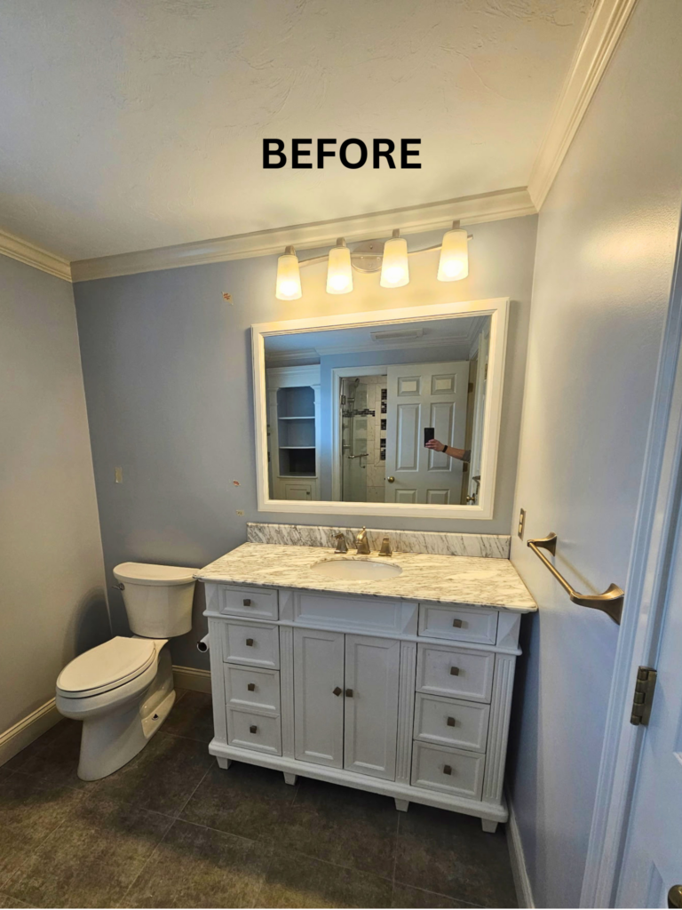 Original floorplan showing single sink vanity and toilet before layout flip