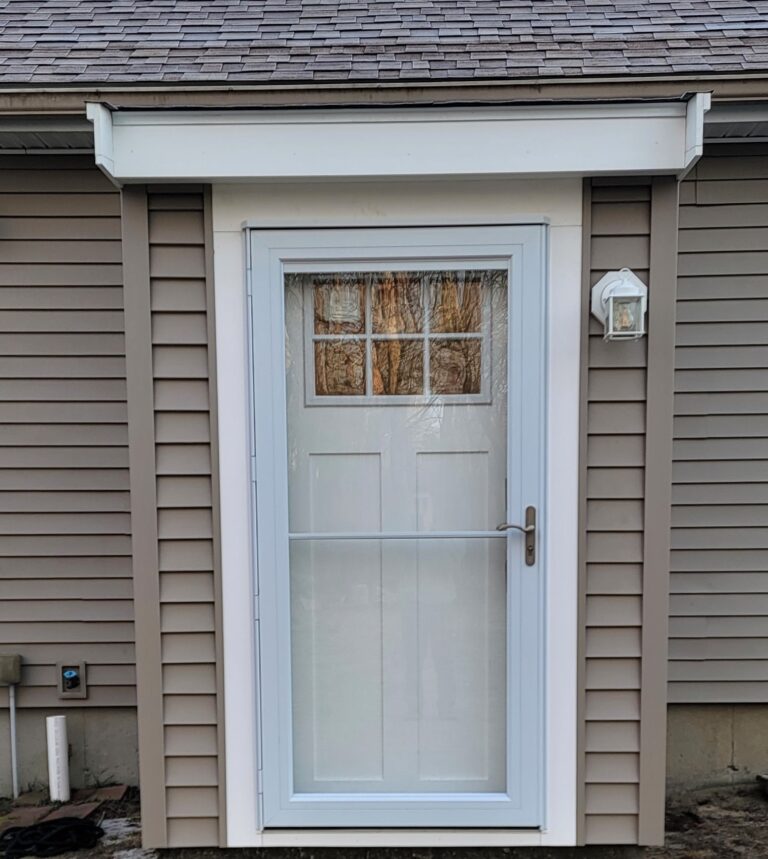 New doghouse‑style entry with seamless exterior integration and improved curb appeal after remodel — Wareham MA